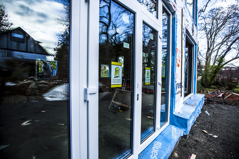 Primary glazing and doors during construction