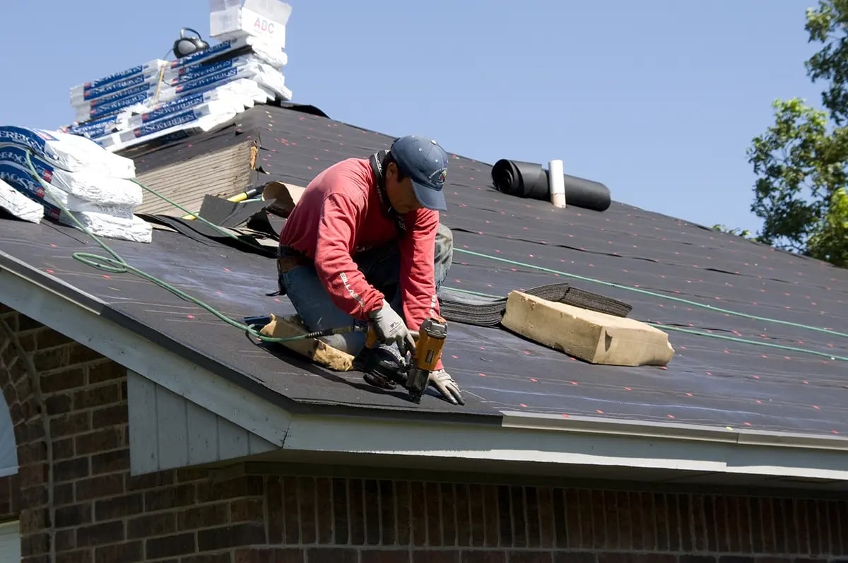 FEMA_-_44634_-_Roofer_working_on_a_home_in_Oklahoma