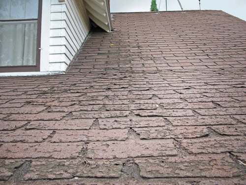 Faster_wear_of_asphalt_shingles_along_eaves
